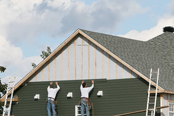Professional Storm Damage Siding Repair technician working in Robinson, IL